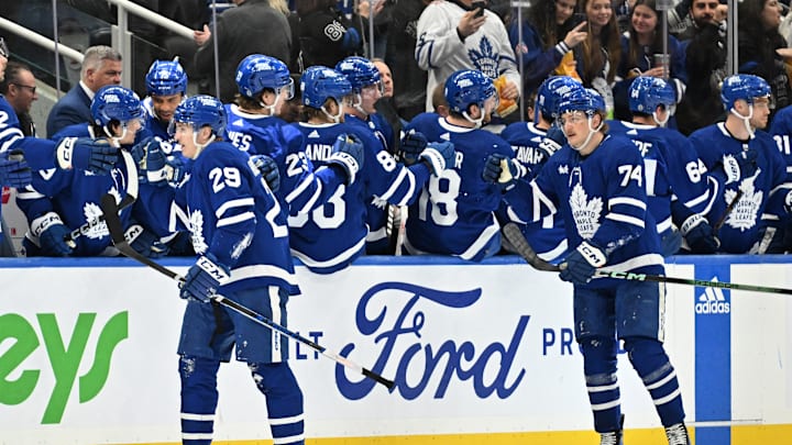 Mar 23, 2024; Toronto, Ontario, CAN; Toronto Maple Leafs forward Pontus Holmberg (29) leads forward Bobby McMann (74) as he celebrates with team mates after scoring against the Edmonton Oilers in the second period at Scotiabank Arena. Mandatory Credit: Dan Hamilton-Imagn Images