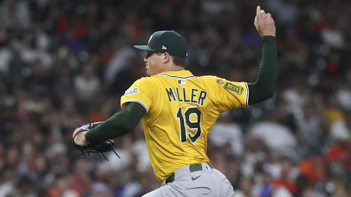Jul 24, 2025; Houston, Texas, USA; Athletics pitcher Mason Miller (19) delivers a pitch during the eighth inning against the Houston Astros at Daikin Park. Mandatory Credit: Troy Taormina-Imagn Images Jul 24, 2025; Houston, Texas, USA; Athletics pitcher Mason Miller (19) delivers a pitch during the eighth inning against the Houston Astros at Daikin Park. Mandatory Credit: Troy Taormina-Imagn Images