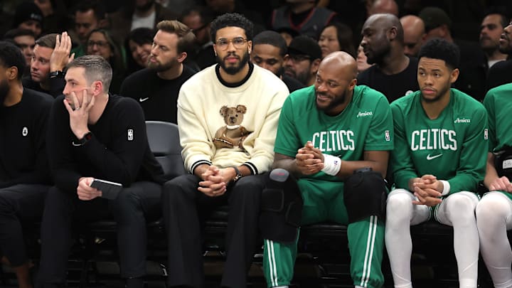 Nov 18, 2025; Brooklyn, New York, USA; Boston Celtics injured forward Jayson Tatum (0) watches from the bench during the third quarter against the Brooklyn Nets at Barclays Center. Mandatory Credit: Brad Penner-Imagn Images