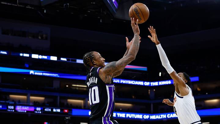 Nov 11, 2025; Sacramento, California, USA; Sacramento Kings guard DeMar DeRozan (10) shoots the ball against Denver Nuggets guard Peyton Watson (8) during the fourth quarter at Golden 1 Center. Mandatory Credit: Sergio Estrada-Imagn Images Nov 11, 2025; Sacramento, California, USA; Sacramento Kings guard DeMar DeRozan (10) shoots the ball against Denver Nuggets guard Peyton Watson (8) during the fourth quarter at Golden 1 Center. Mandatory Credit: Sergio Estrada-Imagn Images