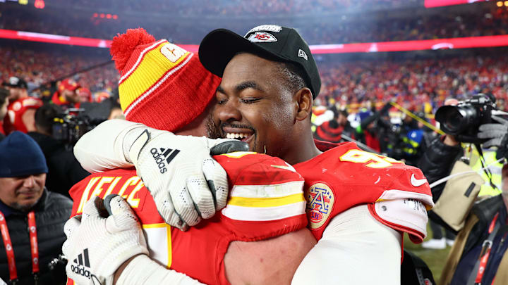 Jan 26, 2025; Kansas City, MO, USA; Kansas City Chiefs tight end Travis Kelce (87) reacts with defensive tackle Chris Jones (95) after the AFC Championship game against the Buffalo Bills at GEHA Field at Arrowhead Stadium. Mandatory Credit: Mark J. Rebilas-Imagn Images