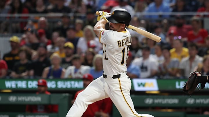 Jun 30, 2025; Pittsburgh, Pennsylvania, USA;  Pittsburgh Pirates right fielder Bryan Reynolds (10) hits a single against the St. Louis Cardinals during the fifth inning at PNC Park. Mandatory Credit: Charles LeClaire-Imagn Images