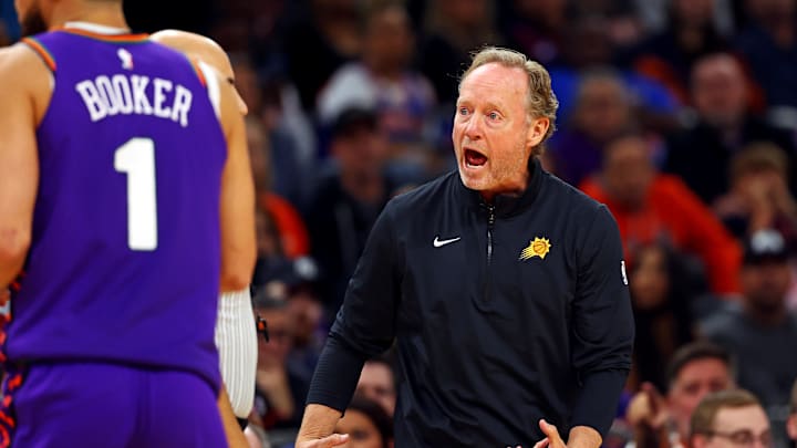 Nov 20, 2024; Phoenix, Arizona, USA; Phoenix Suns head coach Mike Budenholzer yells a referee during the fourth quarter of the game against the New York Knicks at Footprint Center. Mandatory Credit: Mark J. Rebilas-Imagn Images