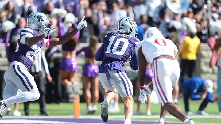 Kansas State Wildcats safety Logan Bartley (10) makes an interception against Kansas Jayhawks during the Sunflower Showdown game at Bill Snyder Family Stadium in Manhattan, Kansas on Oct. 17, 2026. Kansas State Wildcats safety Logan Bartley (10) makes an interception against Kansas Jayhawks during the Sunflower Showdown game at Bill Snyder Family Stadium in Manhattan, Kansas on Oct. 17, 2026.