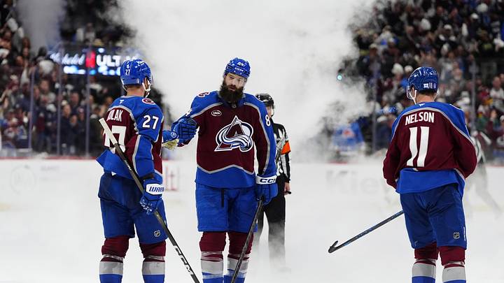 May 5, 2026; Denver, Colorado, USA; Colorado Avalanche defenseman Brett Kulak (27), defenseman Brent Burns (84) and center Brock Nelson (11) celebrate defeating the Minnesota Wild during the third period in game two of the second round of the 2026 Stanley Cup Playoffs at Ball Arena. Mandatory Credit: Ron Chenoy-Imagn Images