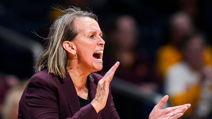 Minnesota Golden Gophers head coach Dawn Plitzuweit cheers on her team Wednesday, April 2, 2025, during the WBIT championship game between the Minnesota Golden Gophers and the Belmont Bruins at Hinkle Fieldhouse in Indianapolis.