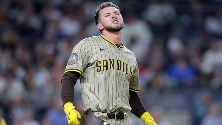 May 7, 2025; Bronx, New York, USA; San Diego Padres center fielder Jackson Merrill (3) reacts after being hit in the arm by a pitch during the tenth inning against the New York Yankees at Yankee Stadium. Mandatory Credit: Brad Penner-Imagn Images May 7, 2025; Bronx, New York, USA; San Diego Padres center fielder Jackson Merrill (3) reacts after being hit in the arm by a pitch during the tenth inning against the New York Yankees at Yankee Stadium. Mandatory Credit: Brad Penner-Imagn Images