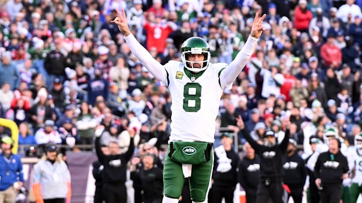 Oct 27, 2024; Foxborough, Massachusetts, USA; New York Jets quarterback Aaron Rodgers (8) reacts after throwing for a touchdown against the New England Patriots during the second half at Gillette Stadium. 