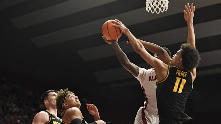 Jan 16, 2024; Tuscaloosa, Alabama, USA; Missouri forward Trent Pierce (11) blocks a shot by Alabama guard Rylan Griffen (3) at Coleman Coliseum. Mandatory Credit: Gary Cosby Jr.-Imagn Images