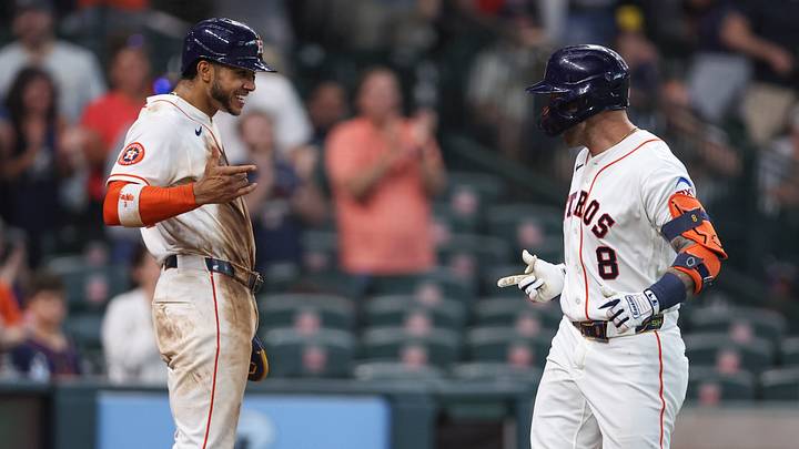 May 30, 2026; Houston, Texas, USA; Houston Astros first baseman Christian Walker (8) celebrates with shortstop Jeremy Pena (3) after hitting a home run during the eighth inning against the Milwaukee Brewers at Daikin Park. Mandatory Credit: Troy Taormina-Imagn Images