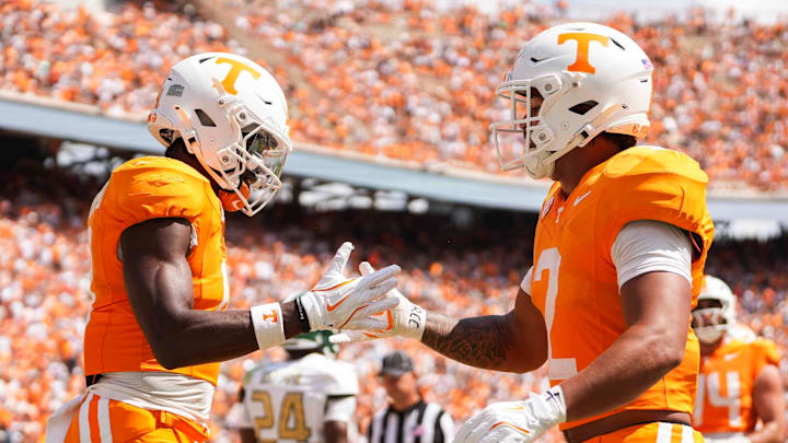 Tennessee wide receiver Mike Matthews (4) celebrates with Tennessee running back Peyton Lewis (2) after Lewis scores a touchdown during a NCAA football game between Tennessee and UAB at Neyland Stadium in Knoxville, Tenn., September 20, 2025.