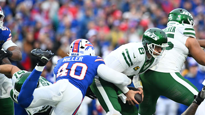 Dec 29, 2024; Orchard Park, New York, USA; New York Jets quarterback Aaron Rodgers (8) is sacked by Buffalo Bills linebacker Von Miller (40) in the third quarter at Highmark Stadium. Mandatory Credit: Mark Konezny-Imagn Images Dec 29, 2024; Orchard Park, New York, USA; New York Jets quarterback Aaron Rodgers (8) is sacked by Buffalo Bills linebacker Von Miller (40) in the third quarter at Highmark Stadium. Mandatory Credit: Mark Konezny-Imagn Images