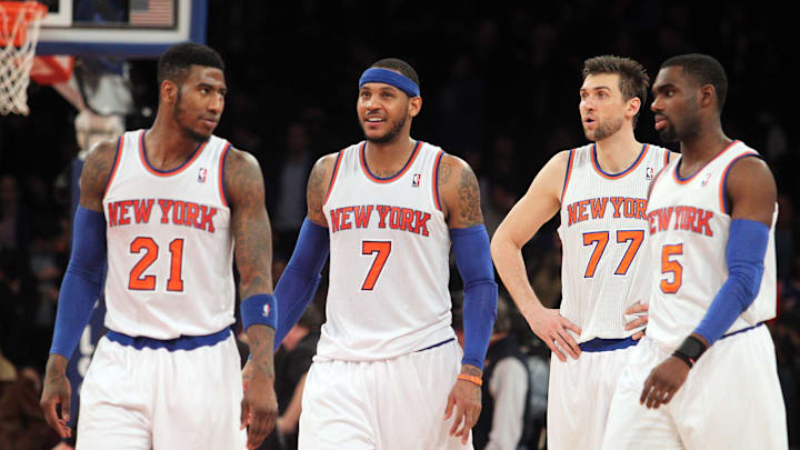 Jan 13, 2014; New York, NY, USA; New York Knicks shooting guard Iman Shumpert (21) and  Knicks small forward Carmelo Anthony (7) and Knicks power forward Andrea Bargnani (77) and Knicks shooting guard Tim Hardaway Jr. (5) take the court for the final 0.2 seconds of the game during overtime of a game against the Phoenix Suns at Madison Square Garden. The Knicks defeated the Suns 98-96 in overtime. Mandatory Credit: Brad Penner-Imagn Images