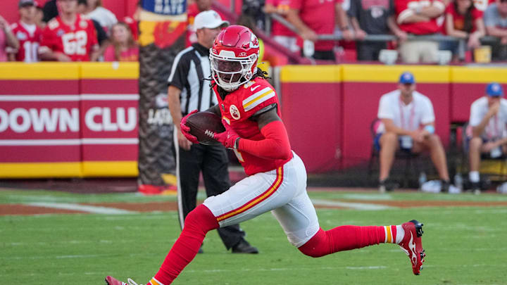 Sep 15, 2024; Kansas City, Missouri, USA; Kansas City Chiefs wide receiver Rashee Rice (4) catches a pass against the Cincinnati Bengals during the game at GEHA Field at Arrowhead Stadium. Mandatory Credit: Denny Medley-Imagn Images