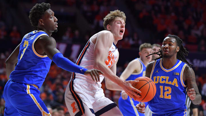 Feb 11, 2025; Champaign, Illinois, USA; Illinois Fighting Illini guard Kasparas Jakucionis (32) drives to the basket during the first half against the UCLA Bruins at State Farm Center. Mandatory Credit: Ron Johnson-Imagn Images Feb 11, 2025; Champaign, Illinois, USA; Illinois Fighting Illini guard Kasparas Jakucionis (32) drives to the basket during the first half against the UCLA Bruins at State Farm Center. Mandatory Credit: Ron Johnson-Imagn Images