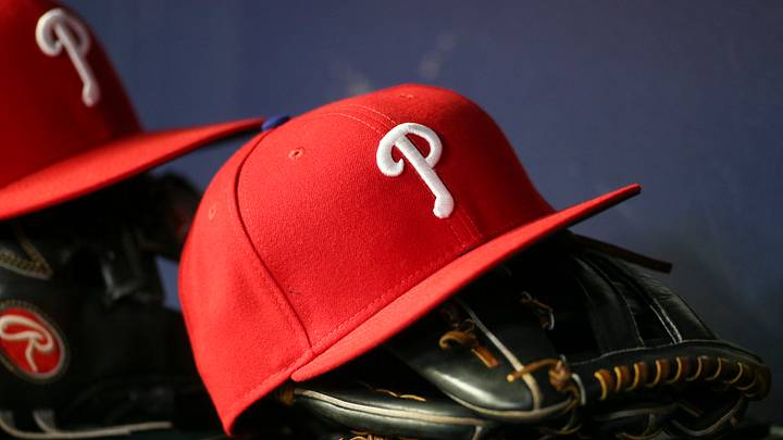May 25, 2022; Atlanta, Georgia, USA; Detailed view of a Philadelphia Phillies hat and glove in the dugout against the Atlanta Braves in the eighth inning at Truist Park. Mandatory Credit: Brett Davis-USA TODAY Sports May 25, 2022; Atlanta, Georgia, USA; Detailed view of a Philadelphia Phillies hat and glove in the dugout against the Atlanta Braves in the eighth inning at Truist Park. Mandatory Credit: Brett Davis-USA TODAY Sports