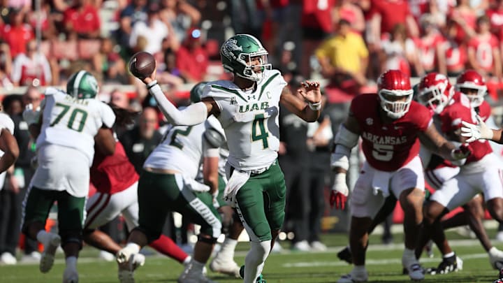 Sep 14, 2024; Fayetteville, Arkansas, USA; UAB Blazers quarterback Jacob Zeno (4) passes in the second quarter against the Arkansas Razorbacks at Donald W. Reynolds Razorback Stadium. Mandatory Credit: Nelson Chenault-Imagn Images