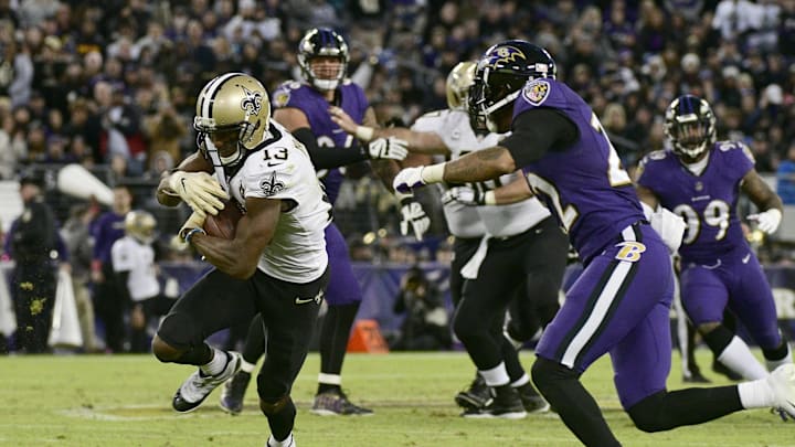Oct 21, 2018; Baltimore, MD, USA;  New Orleans Saints wide receiver Michael Thomas (13) runs after the catch as Baltimore Ravens defensive back Jimmy Smith (22) defends during the fourth quarter at M&T Bank Stadium. Mandatory Credit: Tommy Gilligan-USA TODAY Sports
