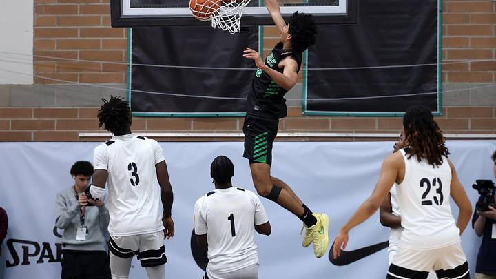 Jan 3, 2025; Gilbert, AZ, USA; Arizona Compass Prep  guard Kaden House (10) slam dunks the ball against CIA Bella Vista (AZ) during the Hoophall West High School Invitational at Highland High School. Mandatory Credit: Mark J. Rebilas-Imagn Images
