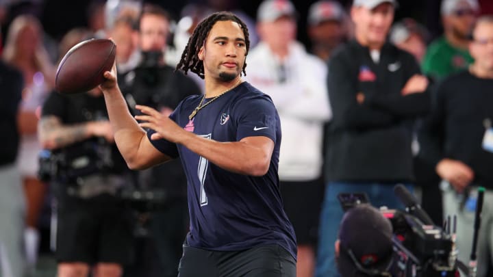 Feb 1, 2024; Orlando, FL, USA;  Houston Texans quarterback C.J. Stroud (7) participates in the NFL Pro Bowl Skills Competition at the UCF NIcholson Fieldhouse. Mandatory Credit: Nathan Ray Seebeck-USA TODAY Sports
