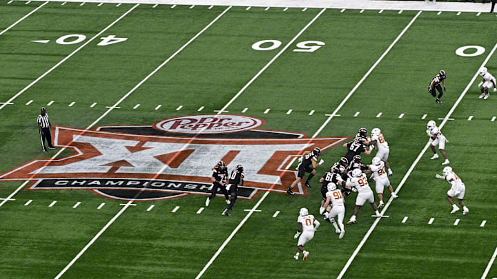 Dec 2, 2023; Arlington, TX, USA;  A view of the Big 12 logo during the first quarter of the game between the Texas Longhorns and the Oklahoma State Cowboys at AT&T Stadium. Mandatory Credit: Jerome Miron-Imagn Images