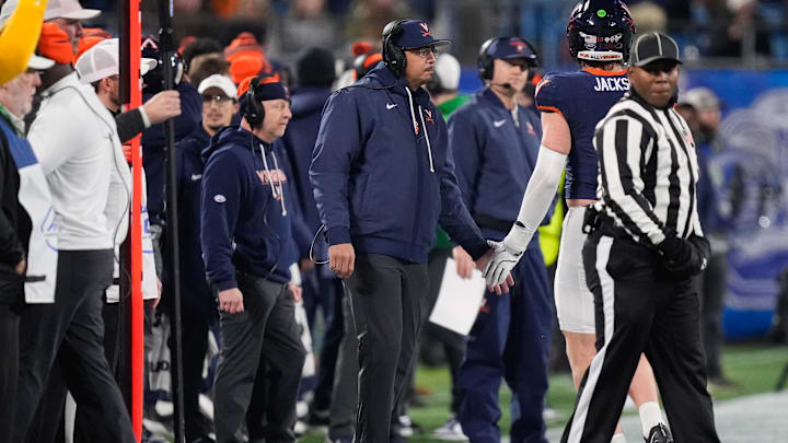 Dec 6, 2025; Charlotte, NC, USA; Virginia Cavaliers head coach Tony Elliott looks on during the first quarter against the Duke Blue Devils during the 2025 ACC Championship game at Bank of America Stadium. Mandatory Credit: Jim Dedmon-Imagn Images