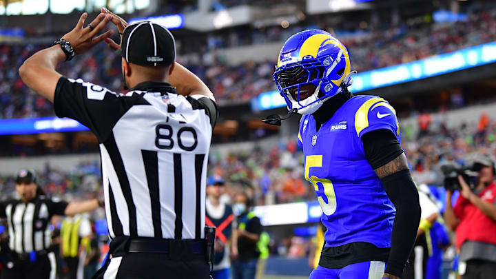 Dec 25, 2022; Inglewood, California, USA; Los Angeles Rams cornerback Jalen Ramsey (5) argues a pass interference call with field judge Alonzo Ramsey (80) during the second half at SoFi Stadium. Mandatory Credit: Gary A. Vasquez-Imagn Images Dec 25, 2022; Inglewood, California, USA; Los Angeles Rams cornerback Jalen Ramsey (5) argues a pass interference call with field judge Alonzo Ramsey (80) during the second half at SoFi Stadium. Mandatory Credit: Gary A. Vasquez-Imagn Images