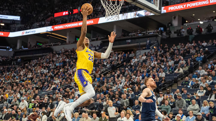 Dec 13, 2024; Minneapolis, Minnesota, USA; Los Angeles Lakers forward Rui Hachimura (28) makes a layup against the Minnesota Timberwolves in the second quarter at Target Center. Mandatory Credit: Matt Blewett-Imagn Images