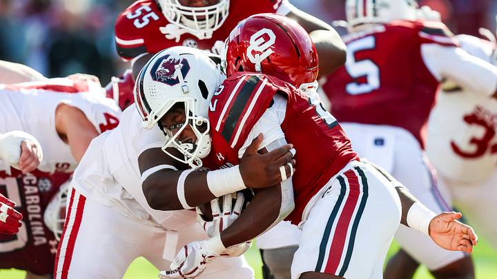 Oklahoma Sooners defensive lineman Markus Strong (99) stops South Carolina Gamecocks running back Matt Fuller (28) in the end zone for a safety in the second half at Williams-Brice Stadium. 