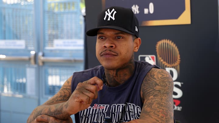 Oct 24, 2024; Los Angeles, CA, USA;  New York Yankees pitcher Marcus Stroman (0) speaks to media during workout day at Dodgers Stadium. 