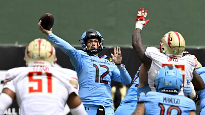Arlington Renegades quarterback Luis Perez (12) passes for a touchdown to wide receiver Isaiah Winstead (not pictured) during the first half against the Birmingham Stallions at Choctaw Stadium.