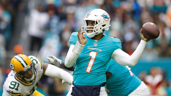 Dec 25, 2022; Miami Gardens, Florida, USA; Miami Dolphins quarterback Tua Tagovailoa (1) throws the