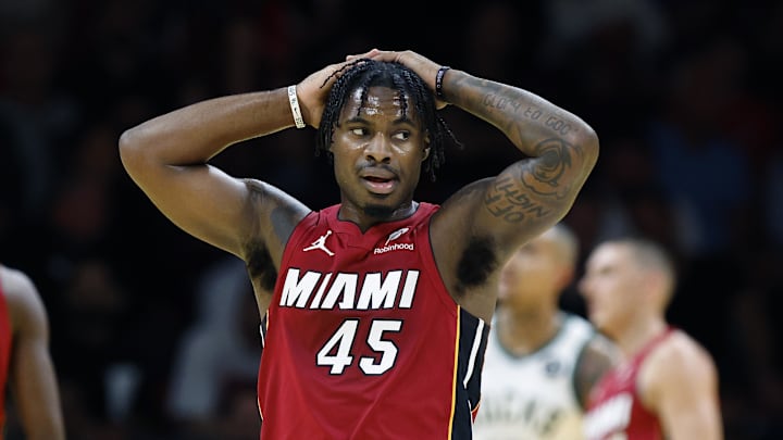 Nov 26, 2025; Miami, Florida, USA; Miami Heat guard Davion Mitchell (45) stands on the court during a time out against the Milwaukee Bucks during the first half of an NBA Cup game at Kaseya Center. Mandatory Credit: Rhona Wise-Imagn Images