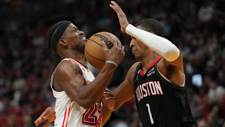 Feb 10, 2023; Miami, Florida, USA; Miami Heat forward Jimmy Butler (22) gets fouled by Houston Rockets forward Jabari Smith Jr. (1) in the first half at Miami-Dade Arena. Mandatory Credit: Jim Rassol-Imagn Images Feb 10, 2023; Miami, Florida, USA; Miami Heat forward Jimmy Butler (22) gets fouled by Houston Rockets forward Jabari Smith Jr. (1) in the first half at Miami-Dade Arena. Mandatory Credit: Jim Rassol-Imagn Images