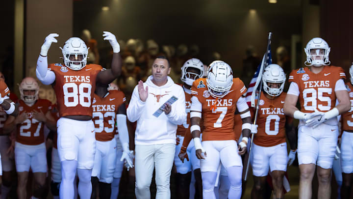 Dec 21, 2024; Austin, Texas, USA; Texas Longhorns head coach Steve Sarkisian leads his team onto the field prior to the game against the Clemson Tigers during the CFP National playoff first round at Darrell K Royal-Texas Memorial Stadium. Mandatory Credit: Mark J. Rebilas-Imagn Images
Dec 21, 2024; Austin, Texas, USA; Texas Longhorns head coach Steve Sarkisian leads his team onto the field prior to the game against the Clemson Tigers during the CFP National playoff first round at Darrell K Royal-Texas Memorial Stadium. Mandatory Credit: Mark J. Rebilas-Imagn Images