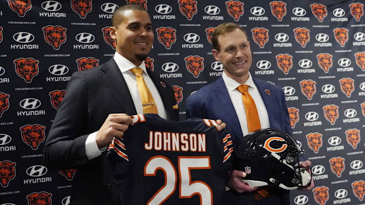 Chicago Bears new head coach Ben Johnson (right) with general manager Ryan Poles pose for photos after a press conference introducing