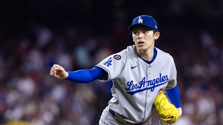 May 9, 2025; Phoenix, Arizona, USA; Los Angeles Dodgers pitcher Roki Sasaki (11) against the Arizona Diamondbacks at Chase Field. Mandatory Credit: Mark J. Rebilas-Imagn Images