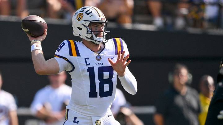 Oct 18, 2025; Nashville, Tennessee, USA;  Louisiana State Tigers quarterback Garrett Nussmeier (18) stands in the pocket against the Vanderbilt Commodores during the first half at FirstBank Stadium. Mandatory Credit: Steve Roberts-Imagn Images