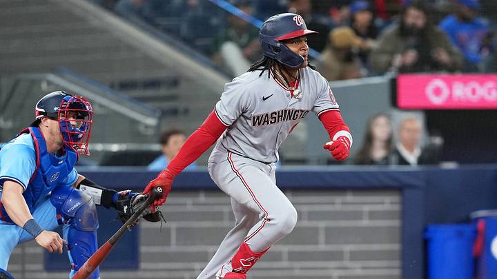 Apr 2, 2025; Toronto, Ontario, CAN; Washington Nationals shortstop CJ Abrams (5) hits a single on a fielder’s choice against the Toronto Blue Jays during the third inning at Rogers Centre. Mandatory Credit: Nick Turchiaro-Imagn Images
