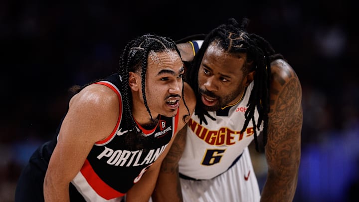 Feb 10, 2025; Denver, Colorado, USA; Portland Trail Blazers guard Dalano Banton (5) and Denver Nuggets center DeAndre Jordan (6) in the fourth quarter at Ball Arena. Mandatory Credit: Isaiah J. Downing-Imagn Images