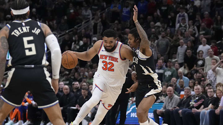 Mar 28, 2025; Milwaukee, Wisconsin, USA; New York Knicks center Karl-Anthony Towns (32) drives to the basket against Milwaukee Bucks forward Chris Livingston (7) in the second half at Fiserv Forum. 