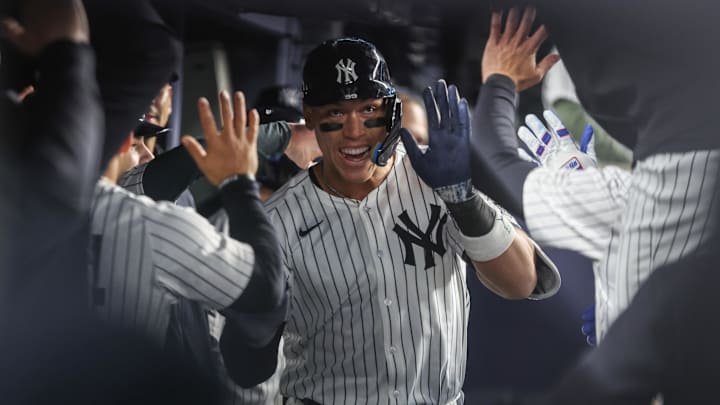 Bronx, New York, USA; New York Yankees designated hitter Aaron Judge (99) is greeted in the dugout after hitting a solo home run in the seventh inning against the Kansas City Royals at Yankee Stadium. Bronx, New York, USA; New York Yankees designated hitter Aaron Judge (99) is greeted in the dugout after hitting a solo home run in the seventh inning against the Kansas City Royals at Yankee Stadium.