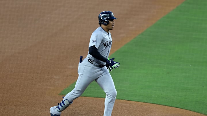 New York Yankees outfielder Juan Soto (22) rounds the bases after hitting a home run against the Los Angeles Dodgers in the third inning for game two of the 2024 MLB World Series at Dodger Stadium on Oct 26.