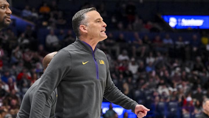 Mar 12, 2025; Nashville, TN, USA; LSU Tigers head coach Matt McMahon yells to his team against the Mississippi State Bulldogs during the first half at Bridgestone Arena. Mandatory Credit: Steve Roberts-Imagn Images