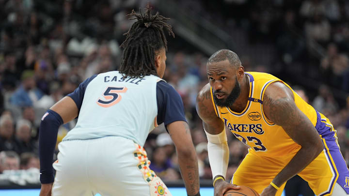 Nov 27, 2024; San Antonio, Texas, USA;  Los Angeles Lakers forward LeBron James (23) faces off against San Antonio Spurs guard Stephon Castle (5) in the second half at Frost Bank Center. Mandatory Credit: Daniel Dunn-Imagn Images