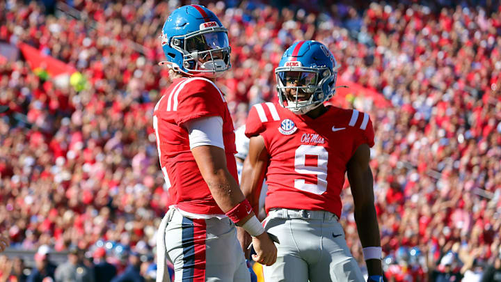 Sep 7, 2024; Oxford, Mississippi, USA; Mississippi Rebels quarterback Jaxson Dart (2) and Mississippi Rebels wide receiver Tre Harris (9) react after a touchdown during the second half against the Middle Tennessee Blue Raiders at Vaught-Hemingway Stadium. Mandatory Credit: Petre Thomas-Imagn Images