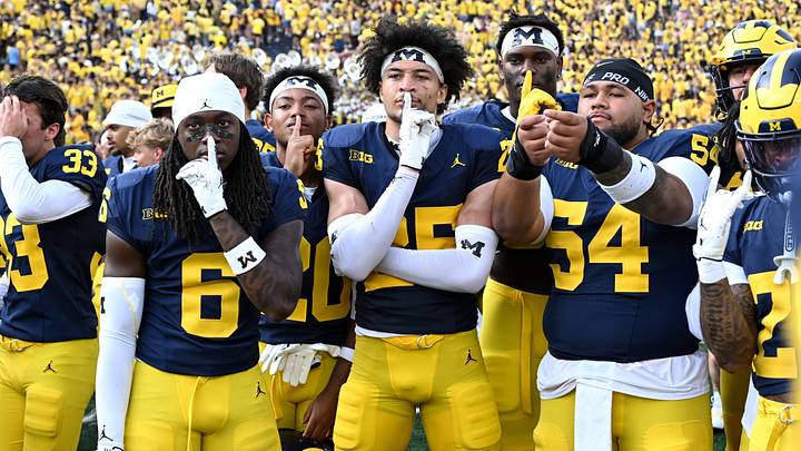Sep 12, 2026; Ann Arbor, Michigan, USA; Michigan Wolverines wide receiver JJ Buchanan (6), safety Mason Curtis (25) and defensive line Deyvid Palepale (54) celebrate after defeating the Oklahoma Sooners in the game at Michigan Stadium. Mandatory Credit: Lon Horwedel-Imagn Images Sep 12, 2026; Ann Arbor, Michigan, USA; Michigan Wolverines wide receiver JJ Buchanan (6), safety Mason Curtis (25) and defensive line Deyvid Palepale (54) celebrate after defeating the Oklahoma Sooners in the game at Michigan Stadium. Mandatory Credit: Lon Horwedel-Imagn Images