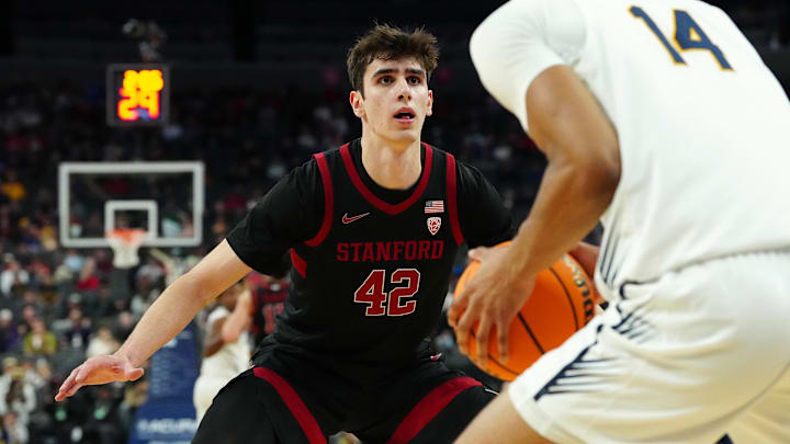 Mar 13, 2024; Las Vegas, NV, USA; Stanford Cardinal forward Maxime Raynaud (42) defends against California Golden Bears forward Grant Newell (14) during the second half at T-Mobile Arena. Mandatory Credit: Stephen R. Sylvanie-Imagn Images Mar 13, 2024; Las Vegas, NV, USA; Stanford Cardinal forward Maxime Raynaud (42) defends against California Golden Bears forward Grant Newell (14) during the second half at T-Mobile Arena. Mandatory Credit: Stephen R. Sylvanie-Imagn Images