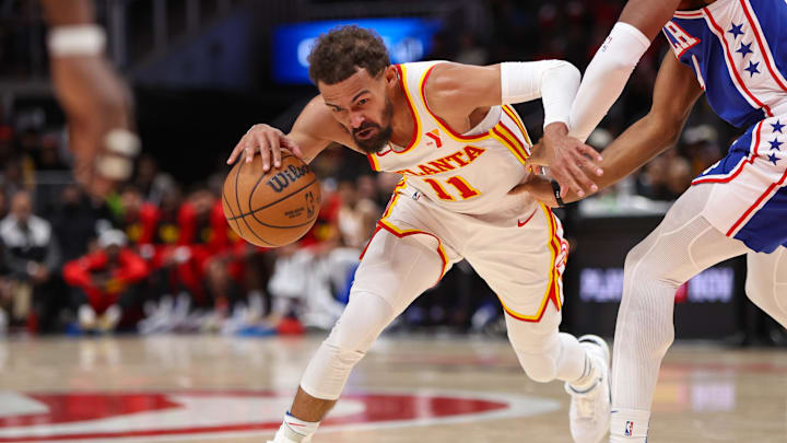 Oct 14, 2024; Atlanta, Georgia, USA; Atlanta Hawks guard Trae Young (11) drives to the basket against the Philadelphia 76ers in the fourth quarter at State Farm Arena. Mandatory Credit: Brett Davis-Imagn Images
