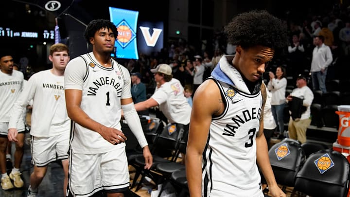 Vanderbilt guard Paul Lewis (3) and forward Colin Smith (1) walk off the court with teammates after losing 67 to 59 against UAB in a National Invitation Tournament quarterfinal game at Memorial Gymnasium Wednesday, March 22, 2023 in Nashville, Tenn.

Nas Vanderbilt Uab 016